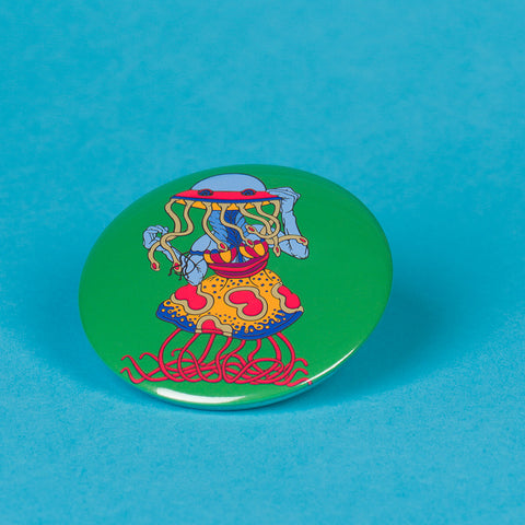 Green Cosmic Disco Art Pin Button By Danica Daydreams On A Blue Background