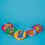 Danica Daydreams Collection six Art Pin Buttons On Blue Background